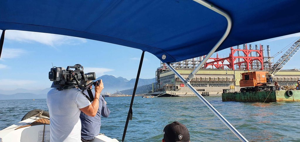 A BPS documentary crew captures a b-roll shot of an oil tanker near Rio de Janeiro for the Smithsonian Channel's Impossible Repairs.