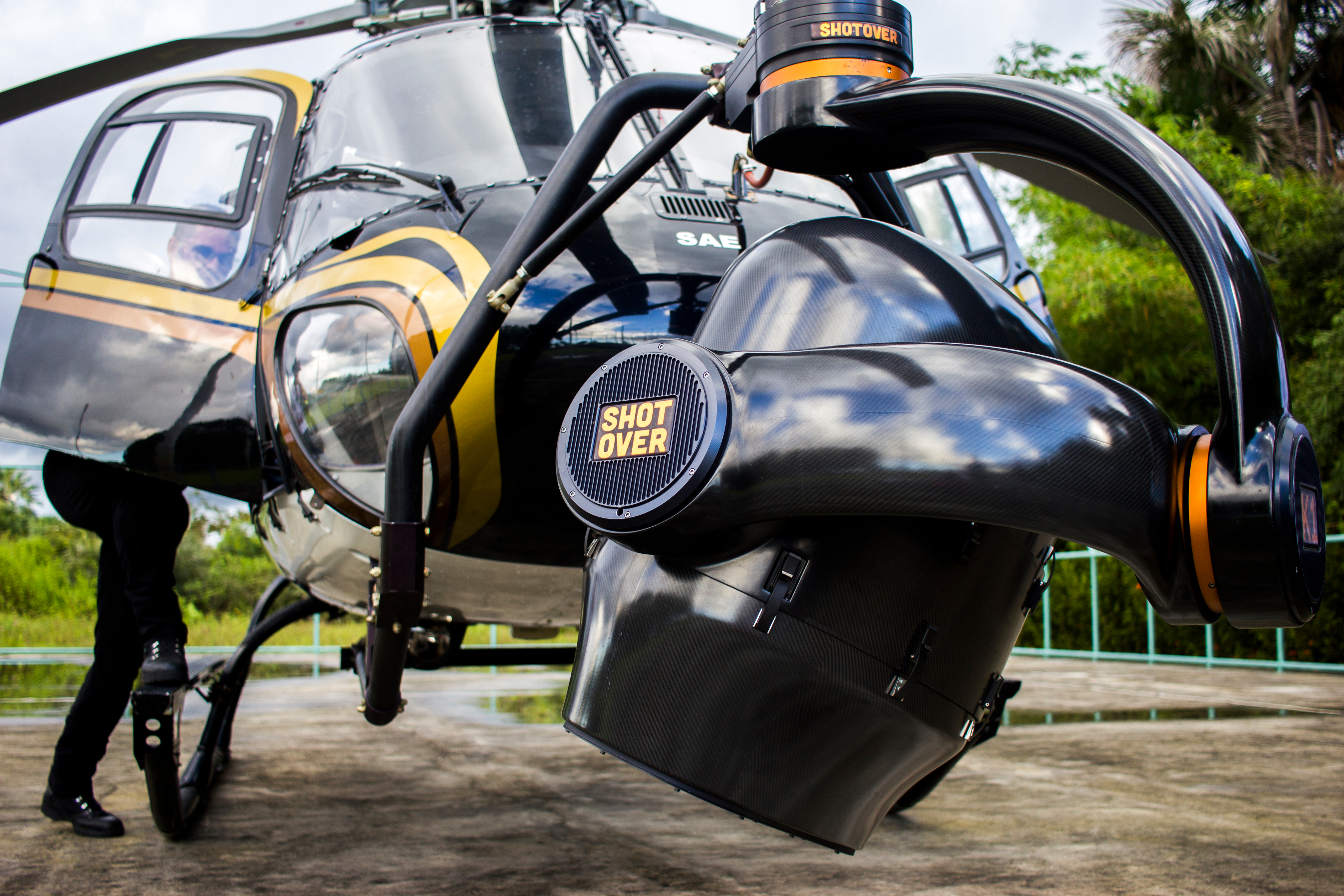 Pilot boards a helicopter with a Shotover system about to capture aerial images on a VFX unit shoot of Disney's Avengers: Infinity War near Lençóis Maranhenses National Park.