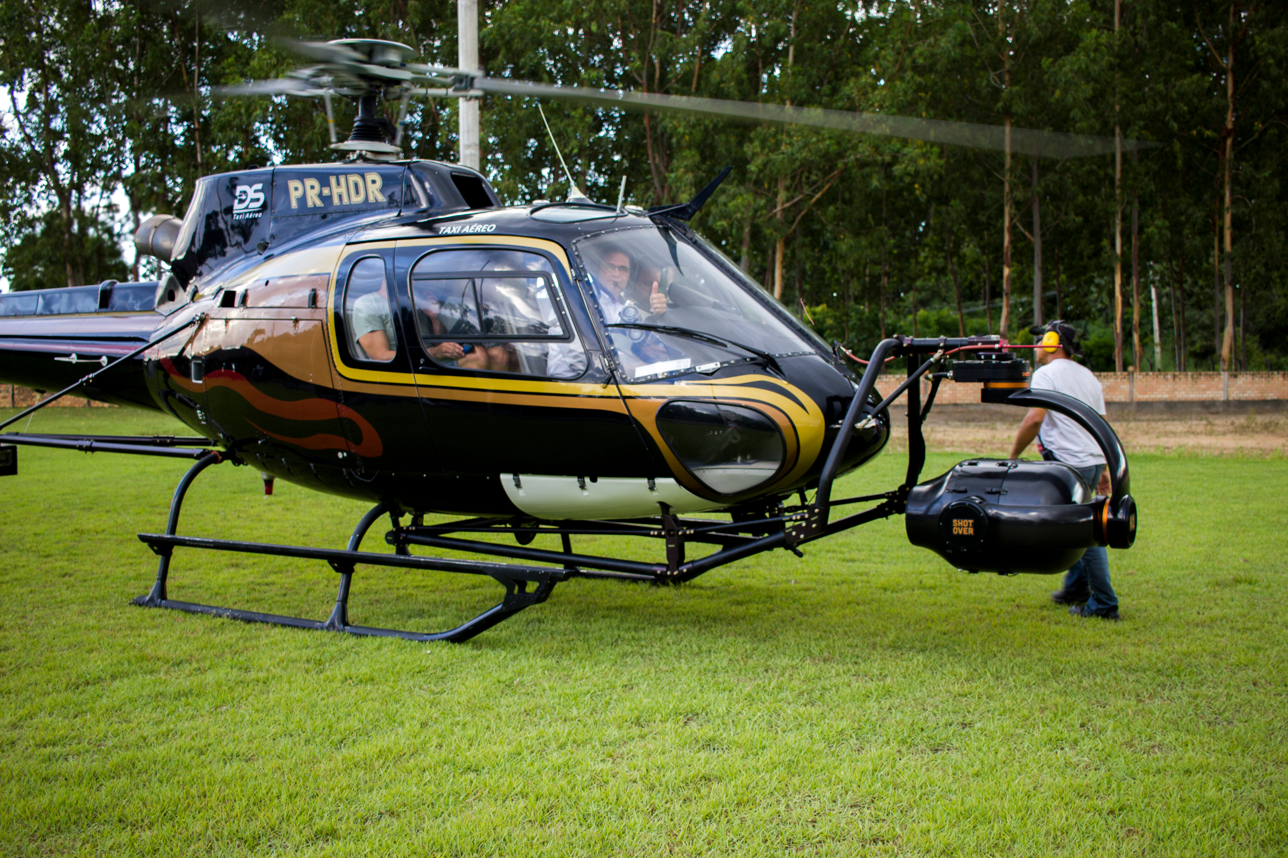 Co-pilot does a safety check before take off of a helicopter equipped with a Shotover system about to capture aerial images on a VFX unit shoot of Disney's Avengers: Infinity War near Lençóis Maranhenses National Park in Brazil.