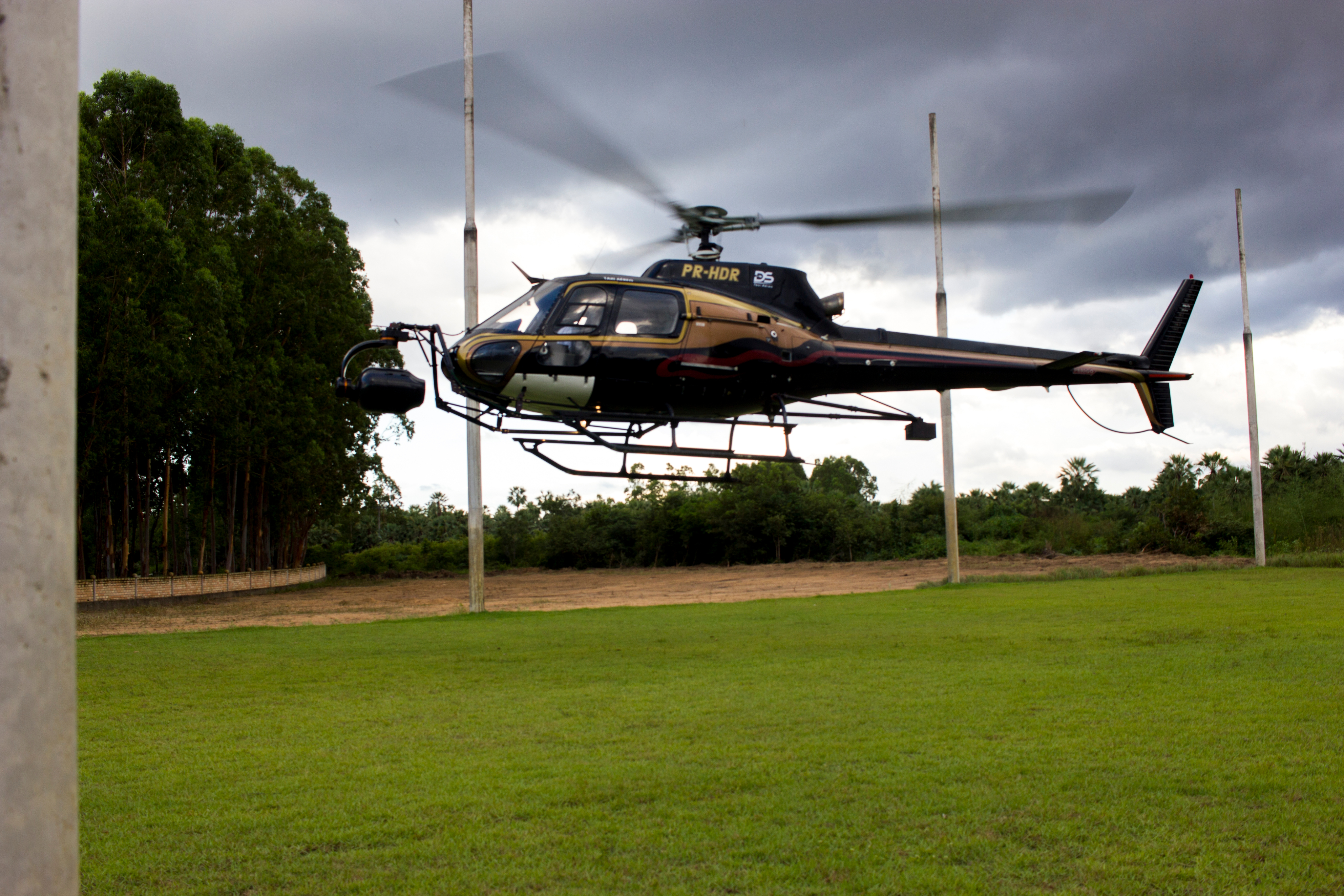 A helicopter equipped with a Shotover system takes off to capture aerial images on a VFX unit shoot of Disney's Avengers: Infinity War near Lençóis Maranhenses National Park in Brazil.
