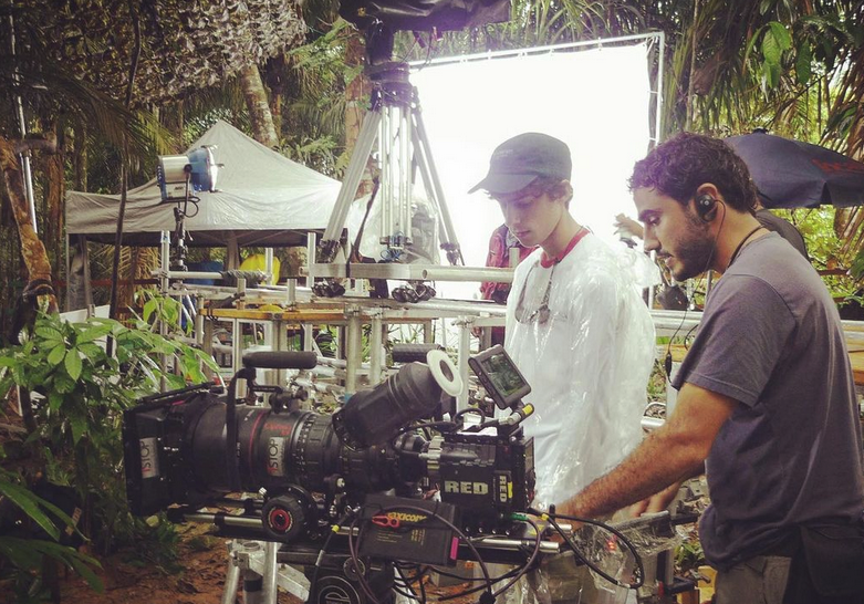 A camera crew sets up a shot in the Amazon jungle, near Manaus.