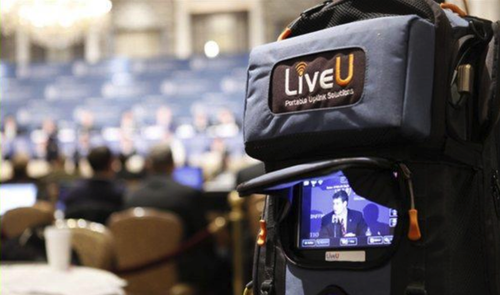 A Brazil Production Services LiveU operator shooting a scene at a corporate event in São Paulo.