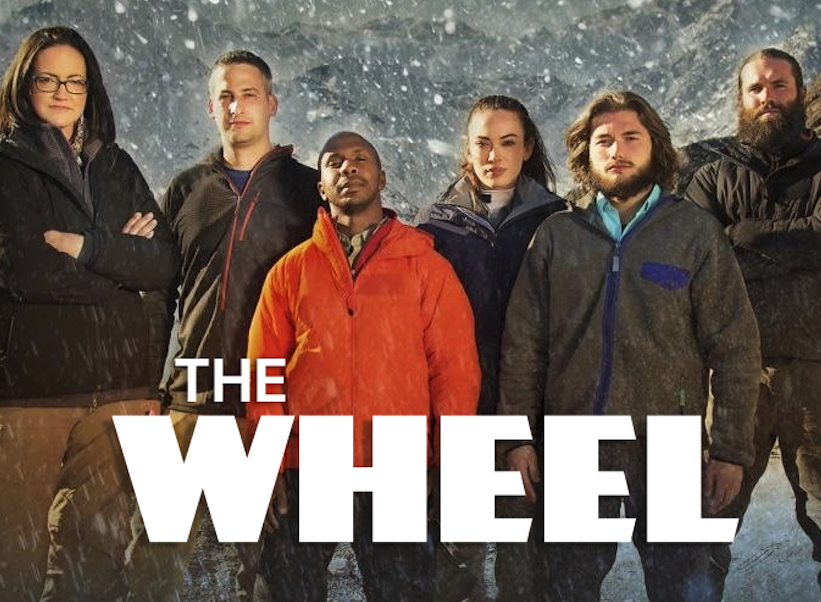 Title card for The Wheel, a Discovery Channel survival reality series produced by Pilgrim Studios, showing the six cast members
