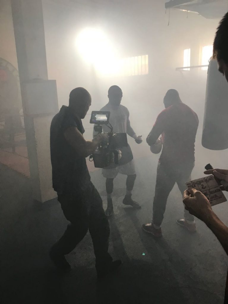 Crew members carrying camera equipment during the Brazil Production Services Decathlon sports shoot